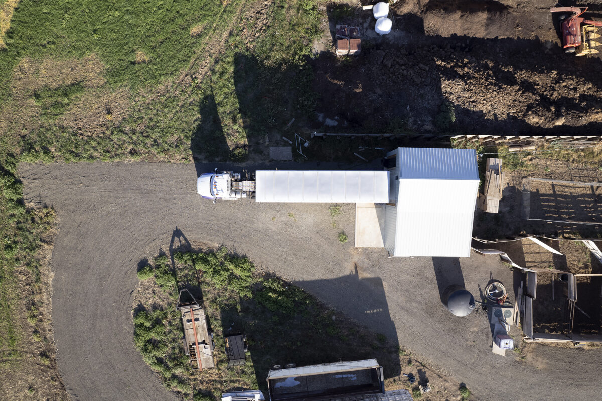 Top-down view of The Meating Place Friesla Mobile Meat Harvest Unit onsite at Top Valley Cattle Co. property.