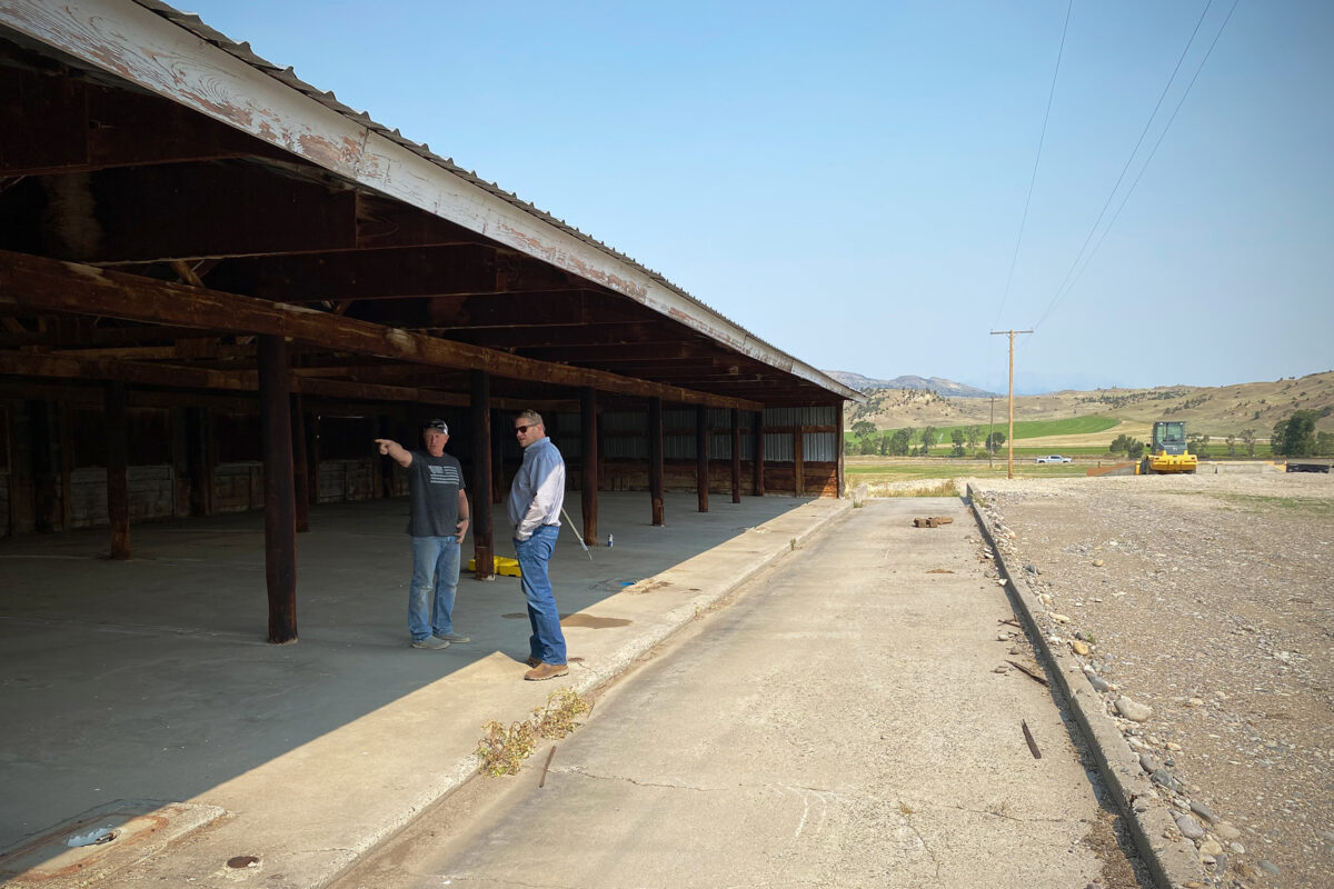 Matt Pierson, President and Founder of The Producer Partnership, and Travis Siebol, Installation Manager at Friesla, discussing Modular Meat Processing System placement on site.